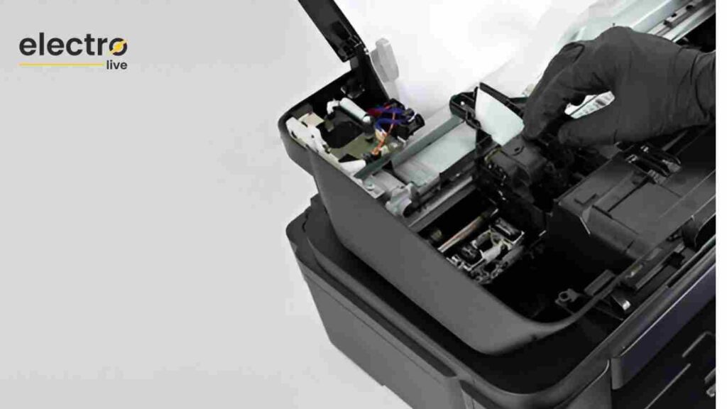 Technician fixing an office printer with tools and spare parts | Fix Printers Near Me | Expert Printer Repair Services